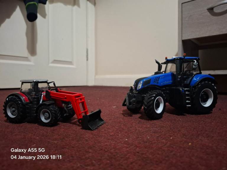 2 toy farm tractors