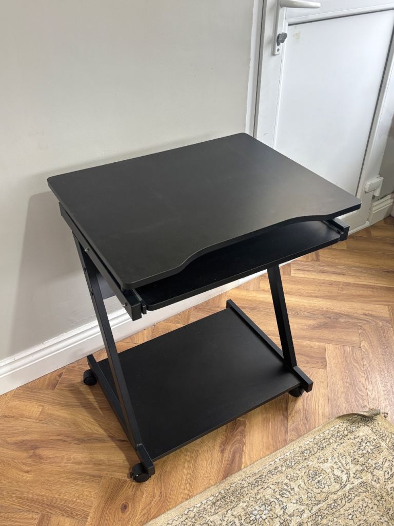 Black Ikea Desk with wheels 