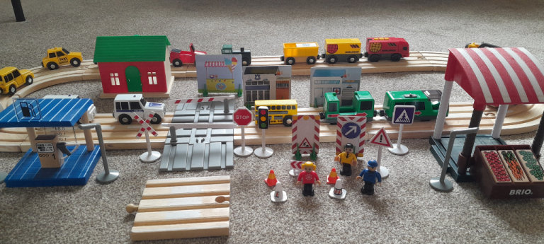 Childs play track with cars, trains and buildings etc.