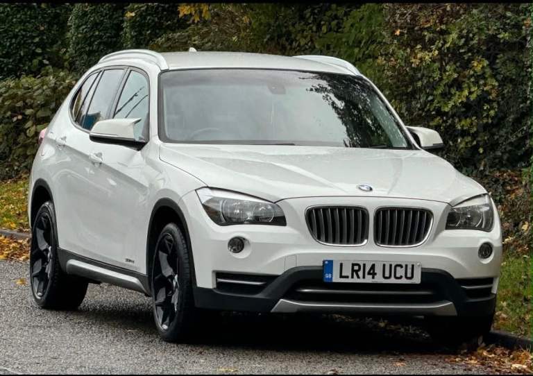 2014 BMW 18d x1, manual, diesel, in white.