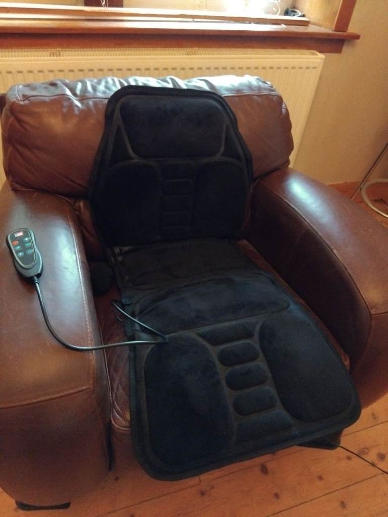 Portable heated massage cushion