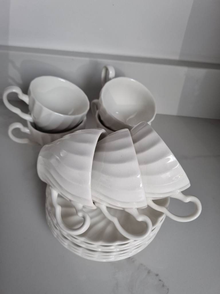 7 china coffee cups and saucers
