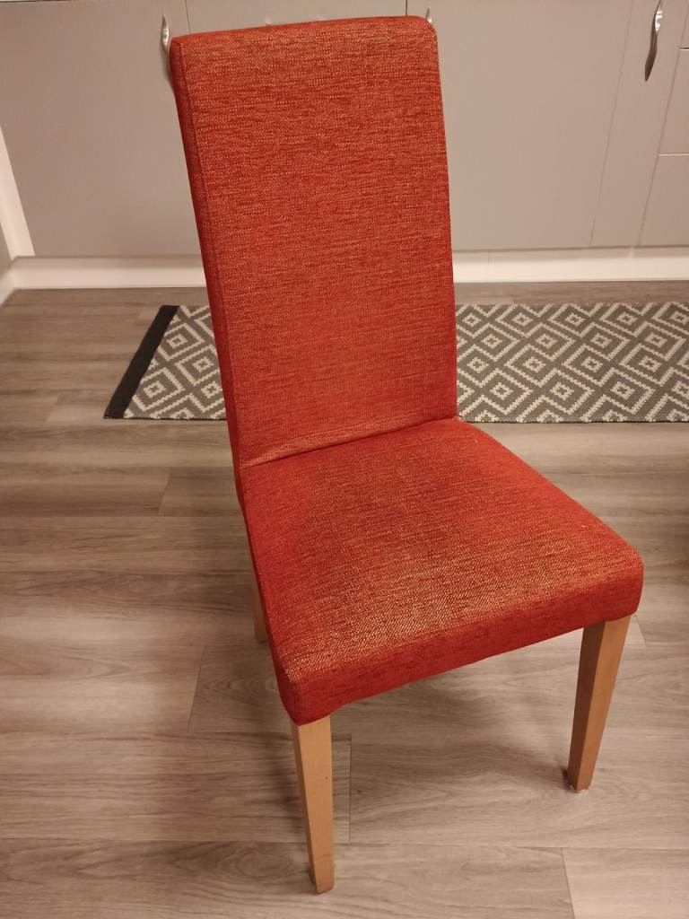 Four burgundy dining chairs
