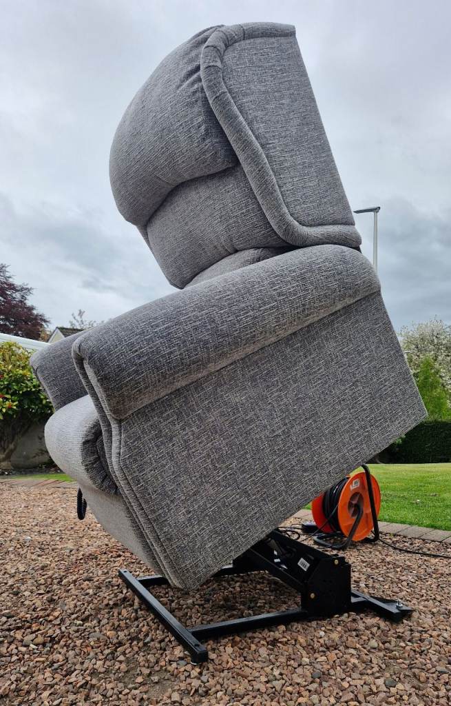 Large grey rise recliner armchair.  Dual motor 