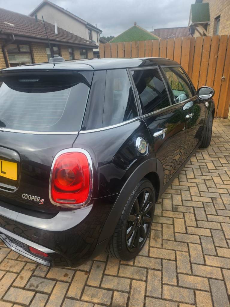 4 door black Mini 2.0ltr sport. Amazing condition 