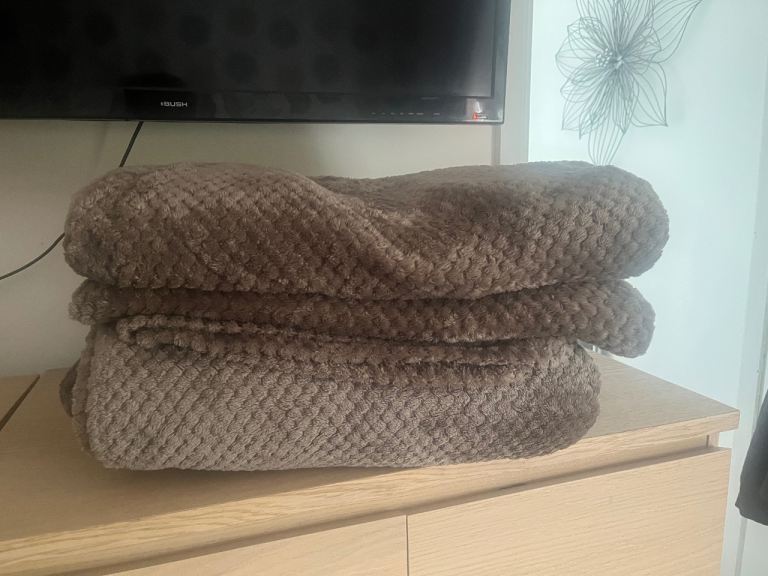Two extra large biege throws 