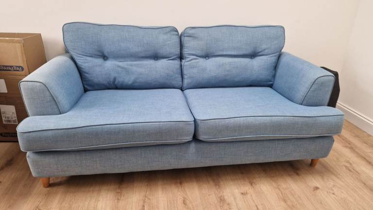 Light blue fabric sofa with washable cover