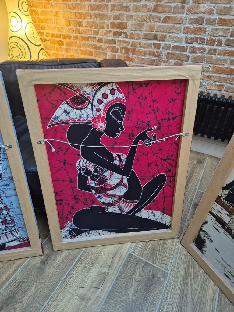 Four batik pictures on wooden frames