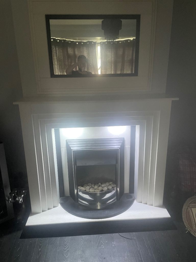Fire place with surround and matching mirror 