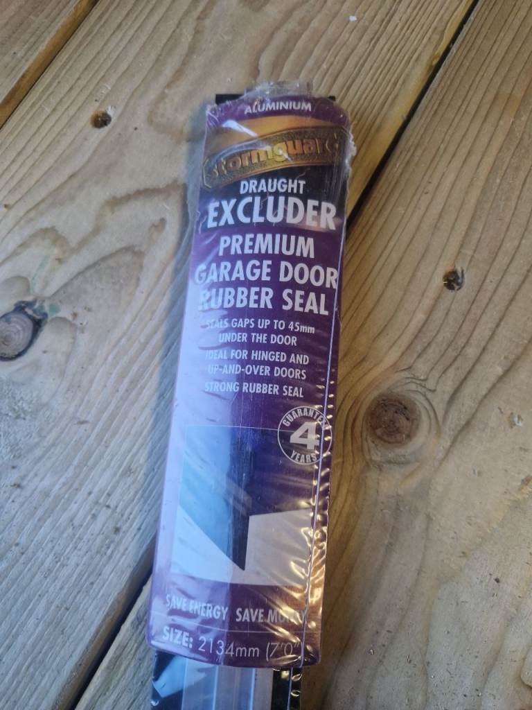 Garage door draft excluder