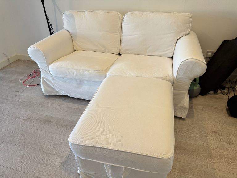 Two seats sofa from IKEA with footstool