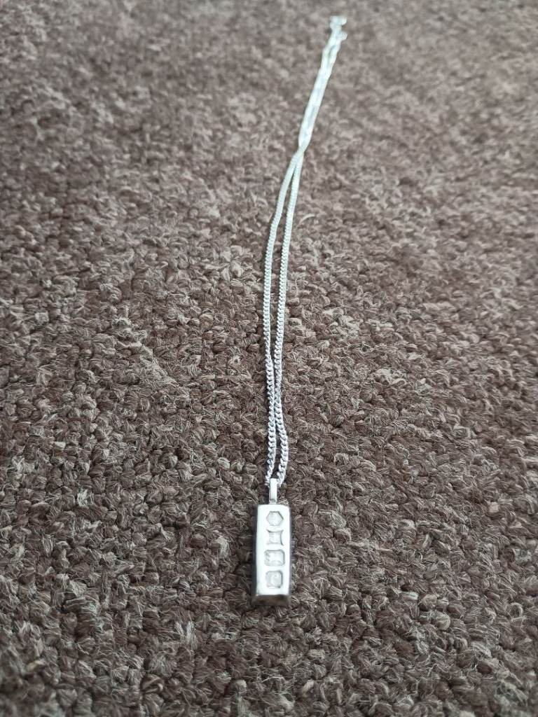 £45 sterling silver necklace with ignot pendant