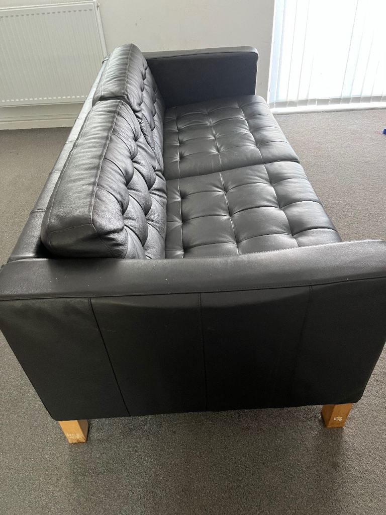 Black Leather Two-Seater Sofa – Good Condition