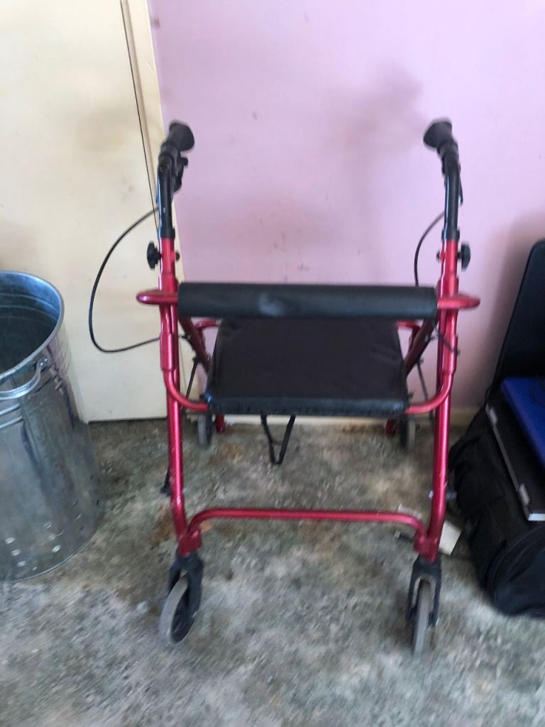 Red Mobility Walker with Seat – Good Condition