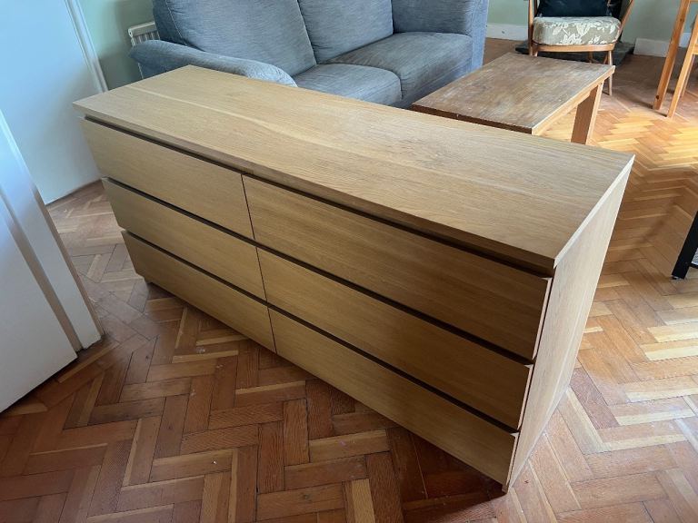 Wide Wooden Chest of Drawers, three seater sofa, solid wooden coffee table and media unit