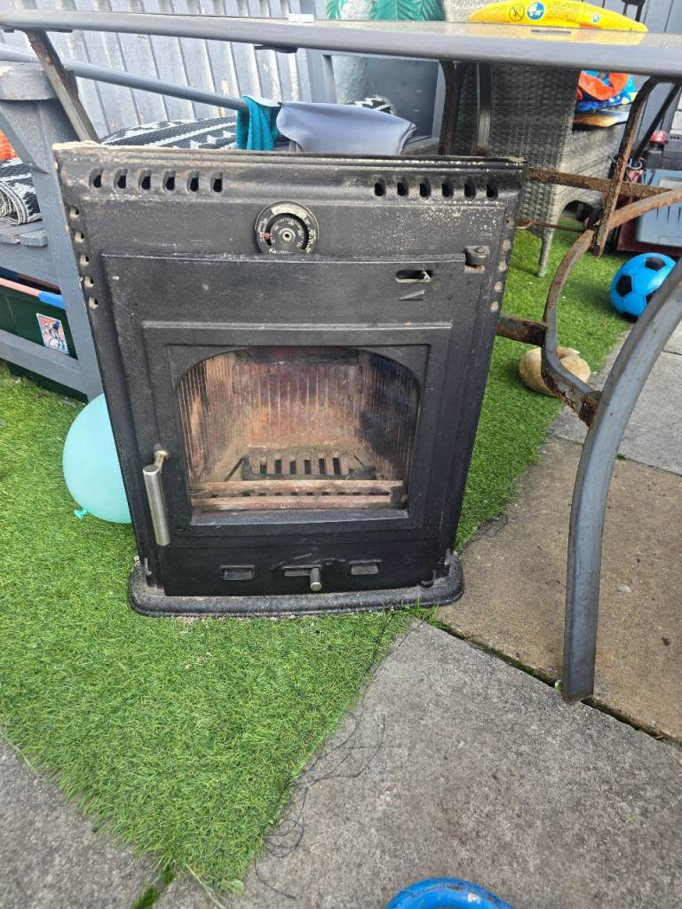 Black Wood Burner – Fair Condition, Ideal for Workshop/Shed