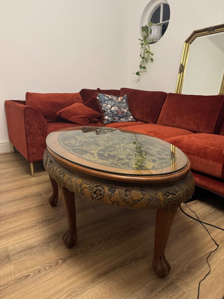 Antique Chinese carved oval coffee table