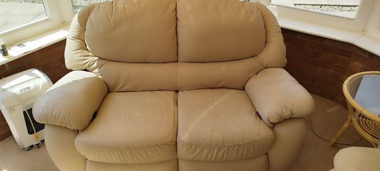 Cream leather Recliner 2 seater sofa, Well used from a smoke free and pet free home