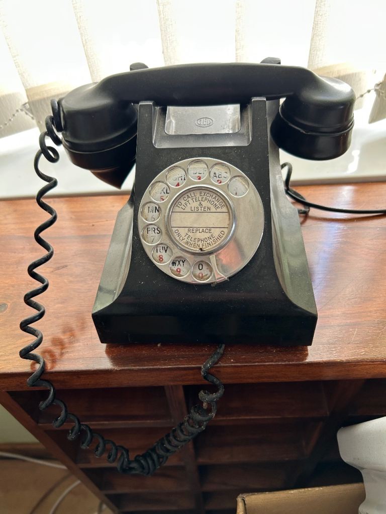 Vintage Bakelite rotary dial black phone