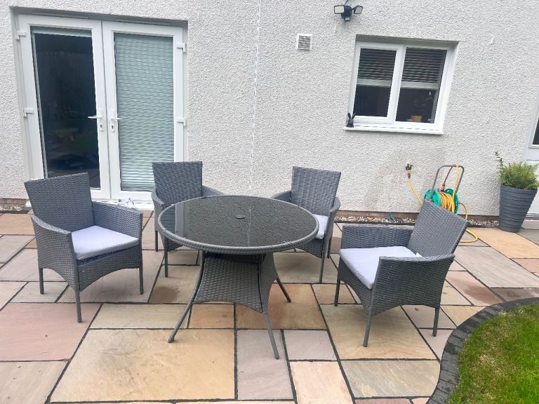 Grey Rattan Patio Dining Set with Four Chairs and Glass Table