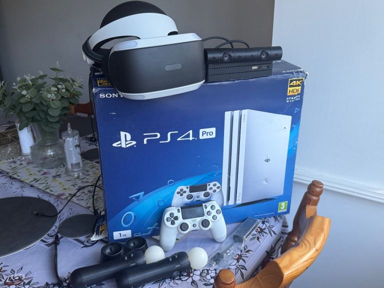 White PS4 Pro 1TB + PSVR Bundle + Games – Excellent Condition