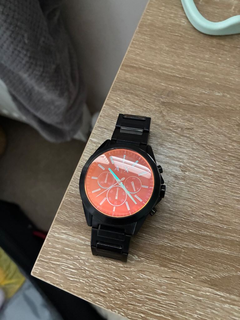 Black Chronograph Watch with Red Dial – Good Condition