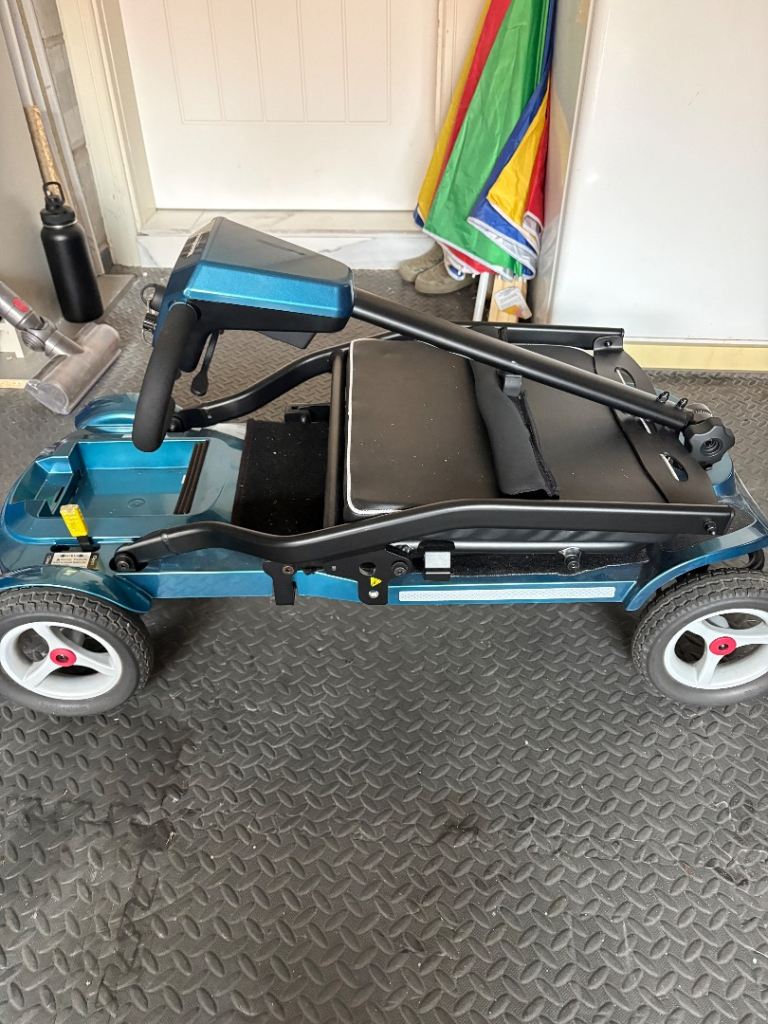 Muick Sandy Monarch foldaway lightweight Motability scooter