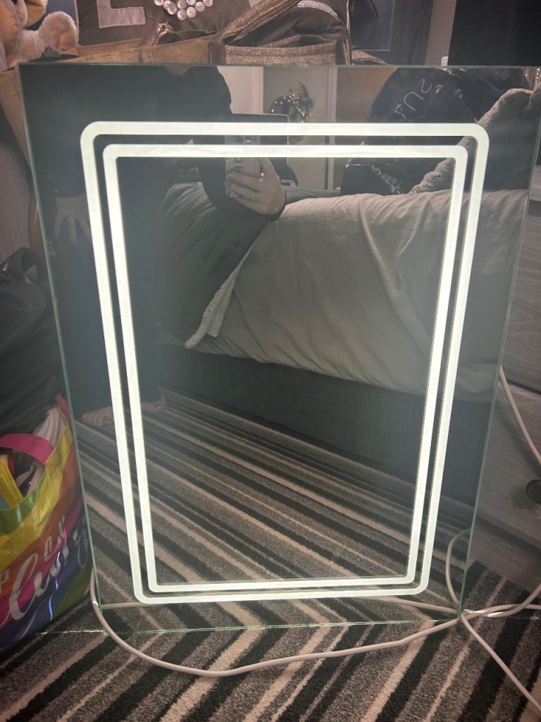 Light up bathroom mirror with shaver point 