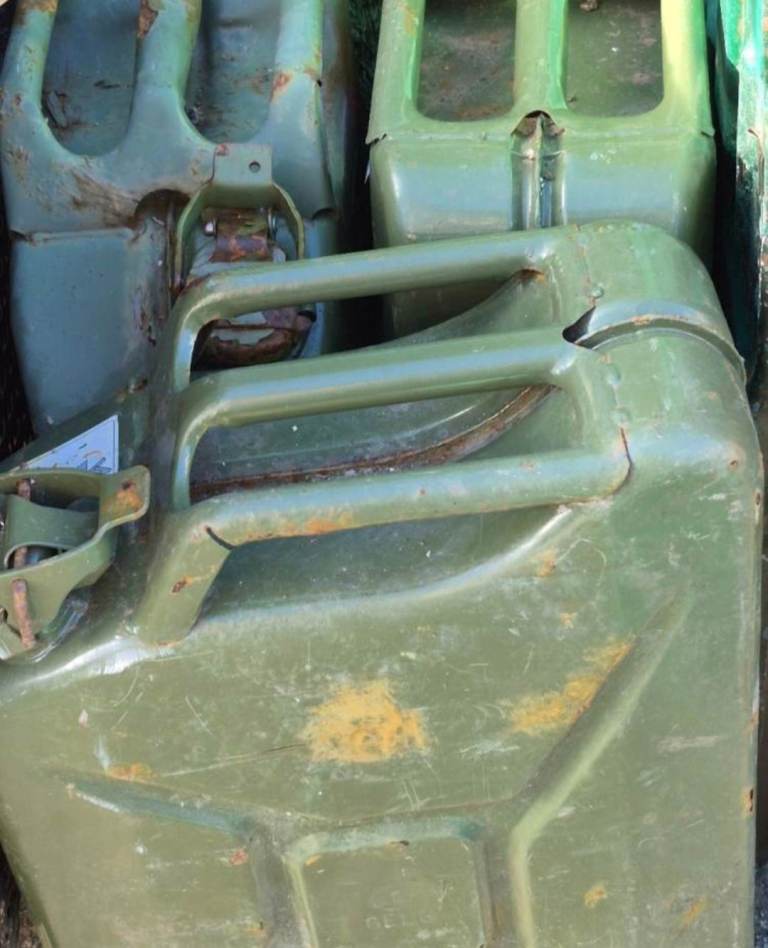 3 jerry cans and army trunk