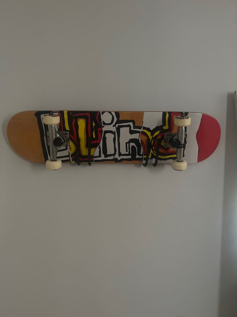 Skateboard with wall mount 