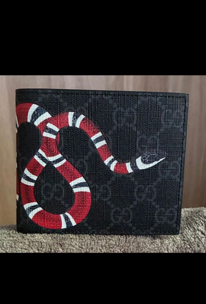 Stylish Gucci Kingsnake wallet brand new with box