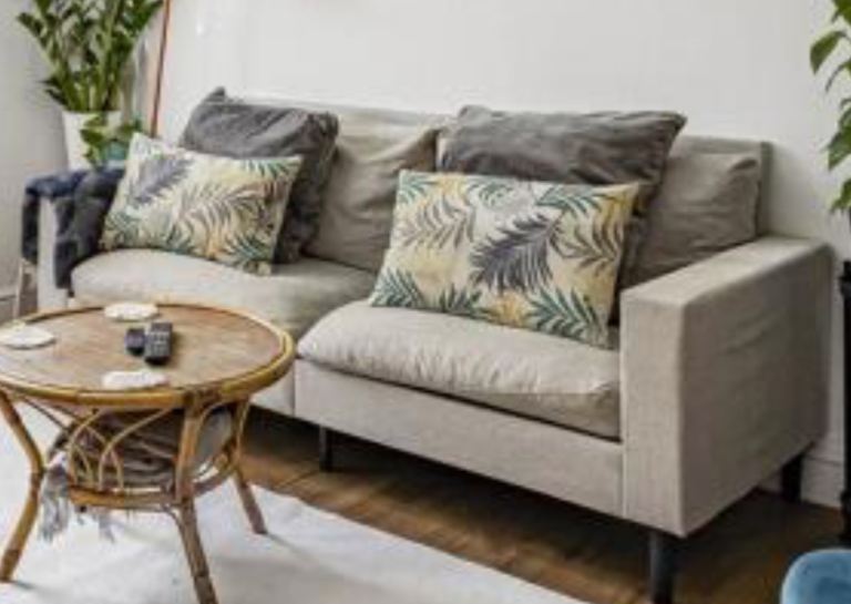 Two-Seater Fabric Sofa – Good Condition, Neutral Beige