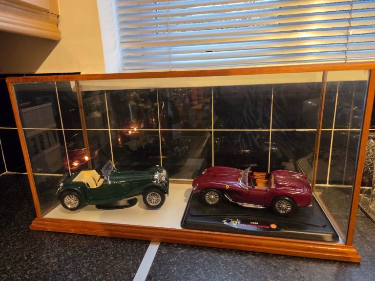 Collectors - diecast cars plus display case 