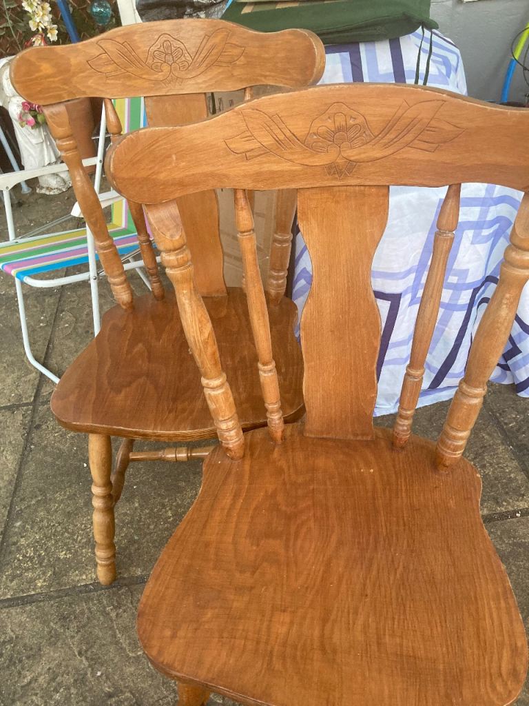 bargain 2 solid wood chairs including padded  cushions