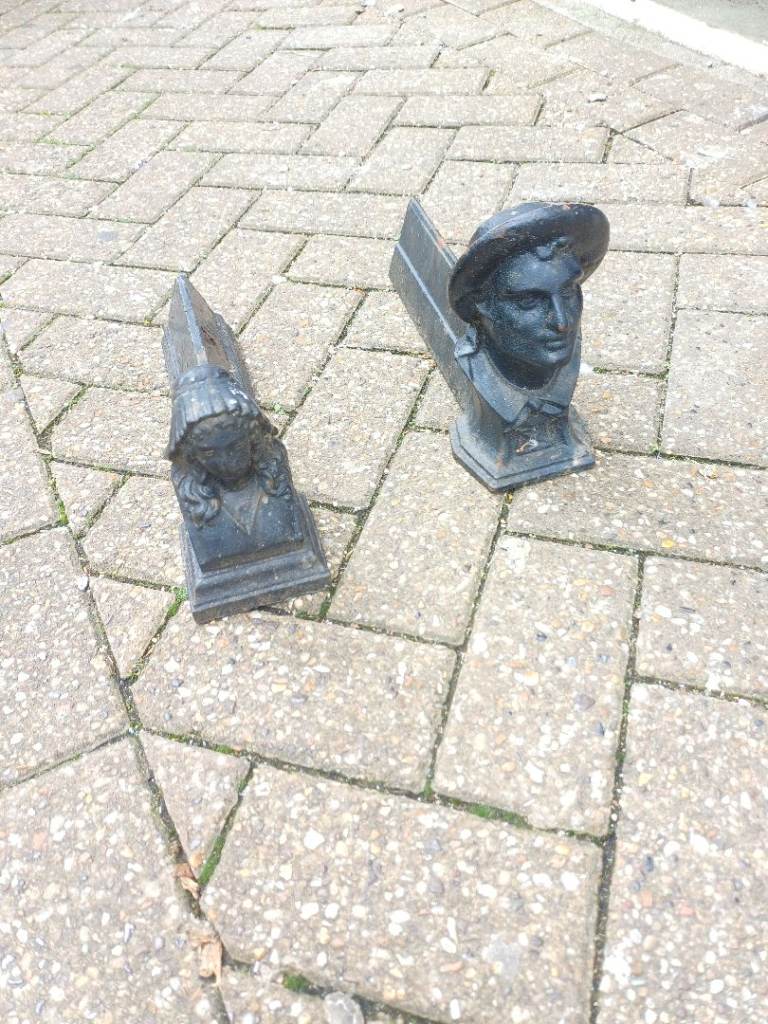 Pair of antique cast iron fire dogs 