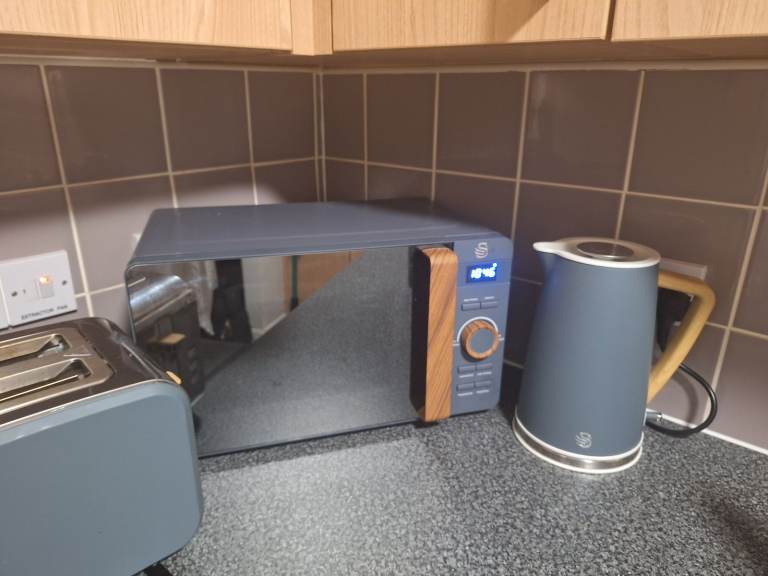Toaster, kettle and microwave set