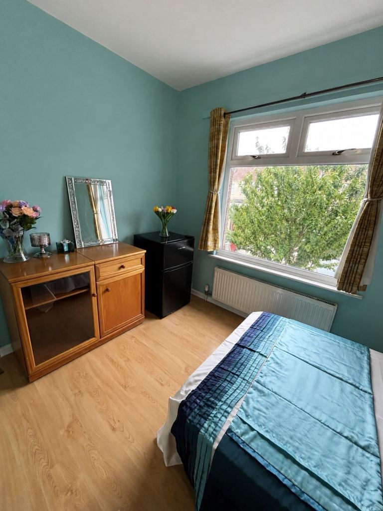 Beautiful specious double bedroom with fridge freezer inside the room 
