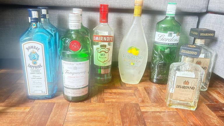 Collection of Empty Spirit Bottles for Crafts or Display