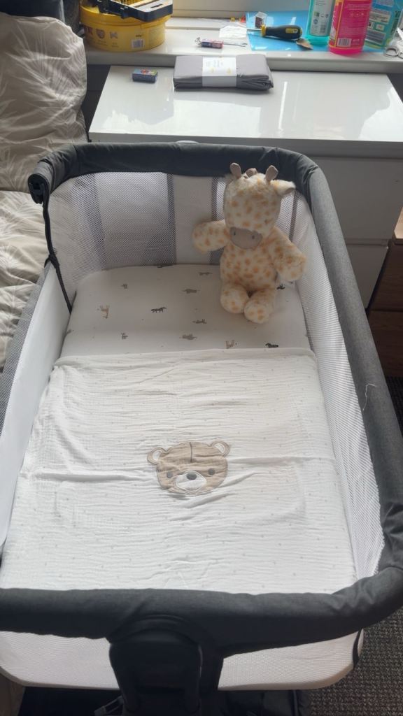 Baby next to me crib