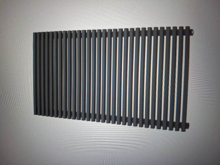 Grey radiators - brand new, still in boxes