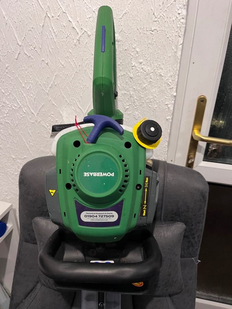 Power base petrol hedge trimmer 