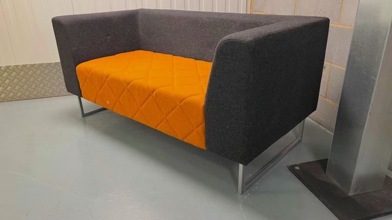 Modern Grey and Orange Two-Seater Sofa – Good Condition