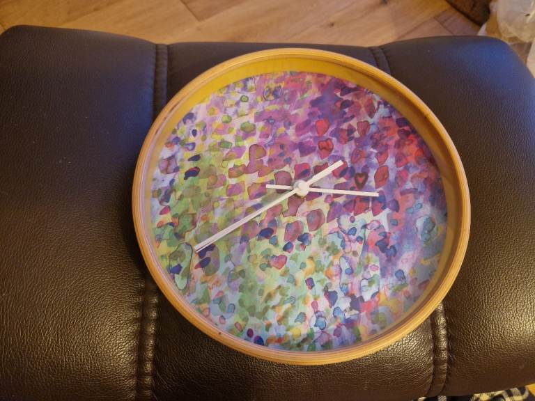 Beautiful abstract purple & green confetti clock