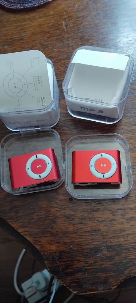 2 X Red MP3 multimedia player in a clear plastic case with cards 