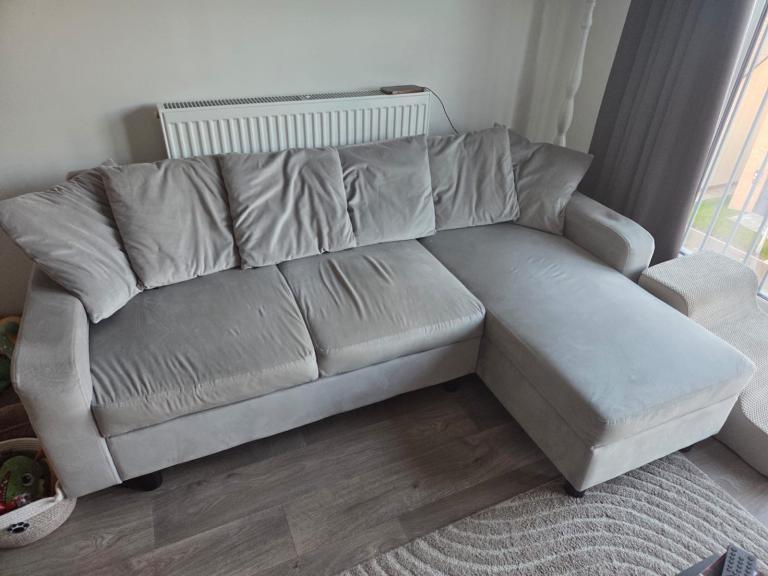 Laura James velvet grey sofa