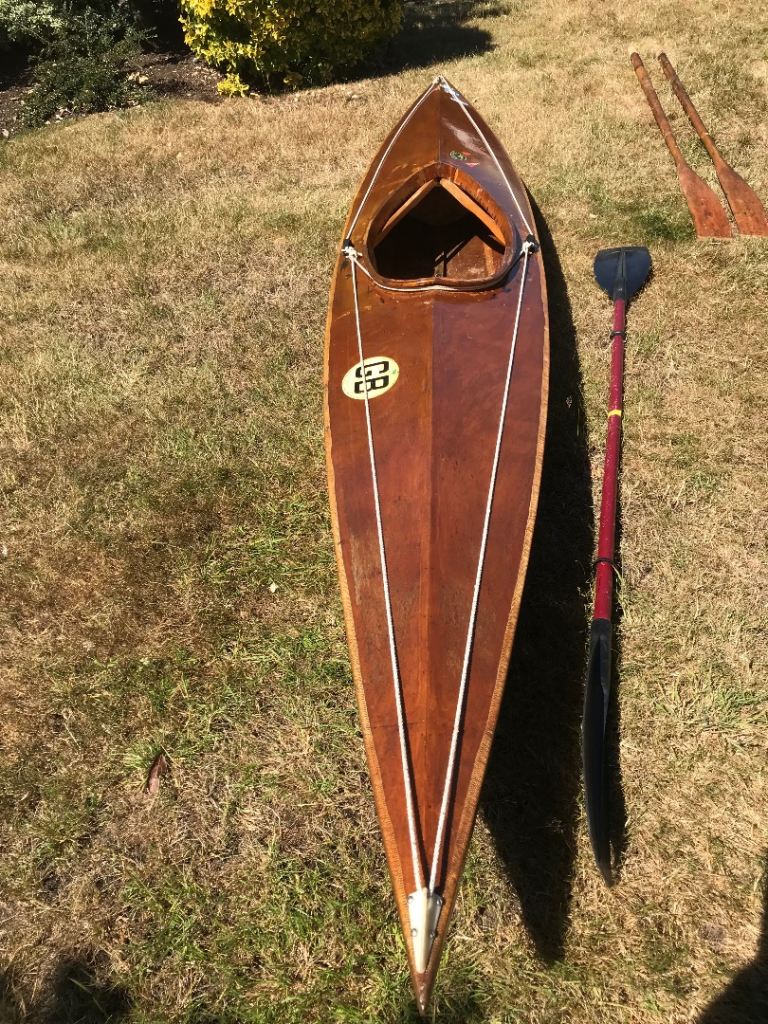 Wooden Kayak with Paddle