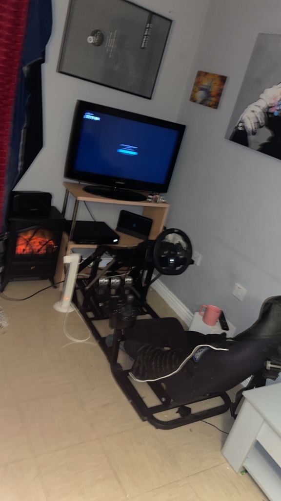 Racing Simulator Cockpit with Steering Wheel and Pedals