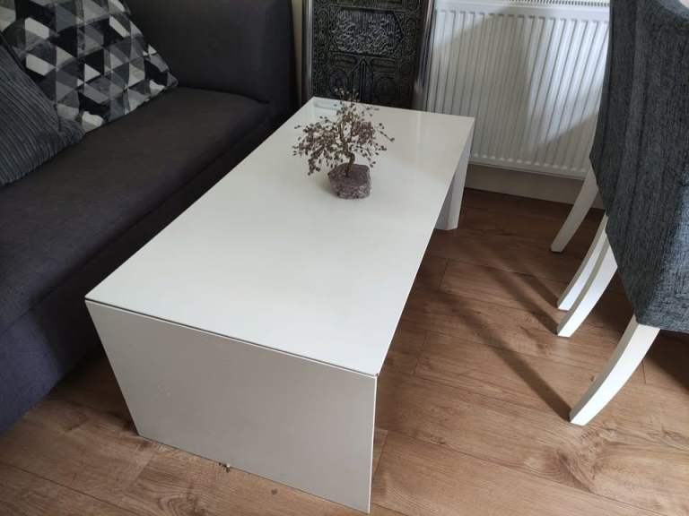 Gloss white coffee table cum dining table with storage