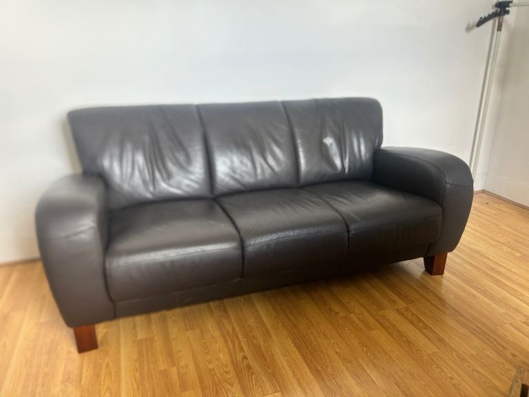 Comfortable Brown Leather Three-Seater Sofa – Good Condition
