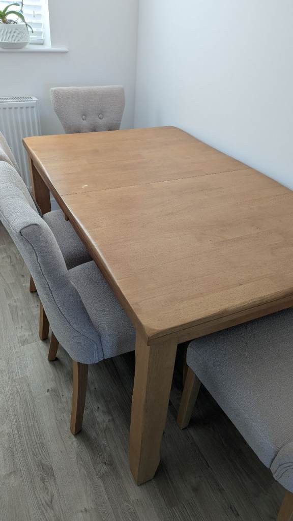 Oak dining table and 4 chairs 